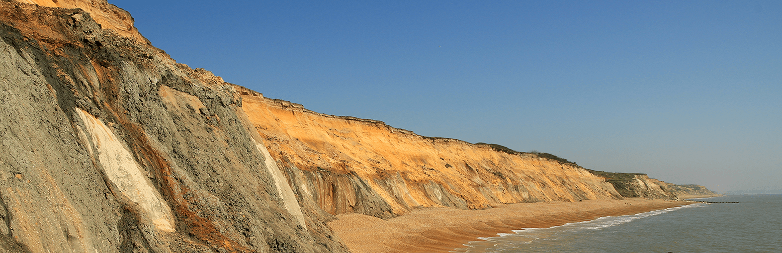 Cliffs at Barton on sea with blue sky