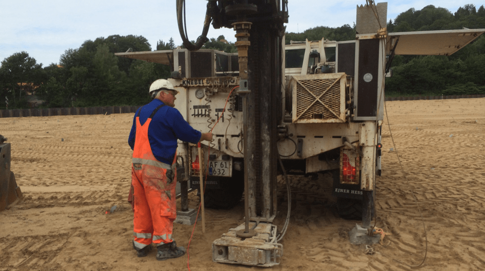 Drilling rig on sandy ground
