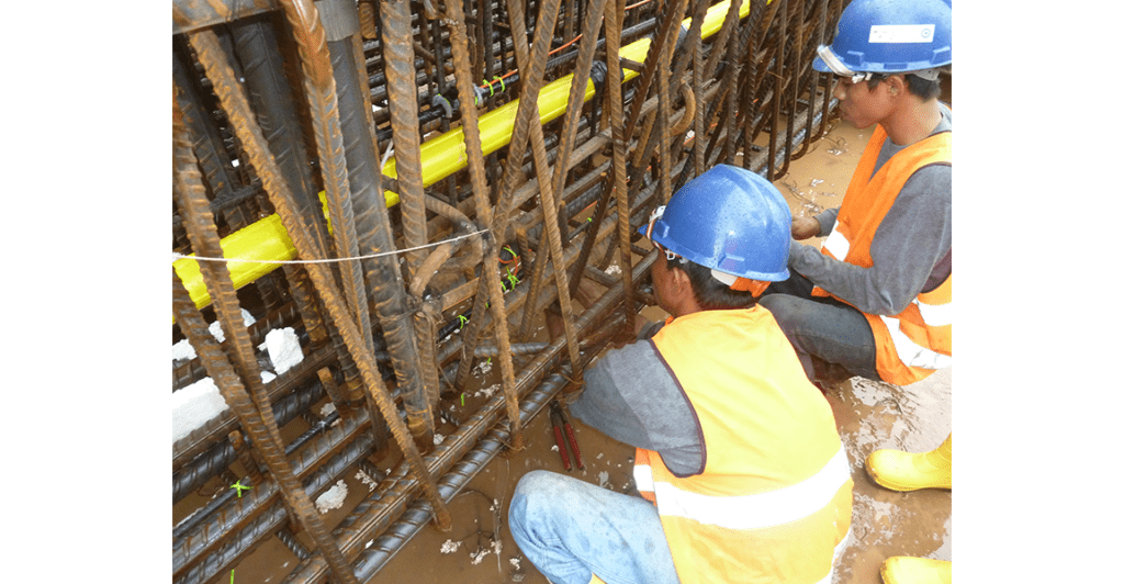 Engineers fixing VWS-4000 Sister bars in diaphragm wall cage for CP106 Jakarta Metro construction
