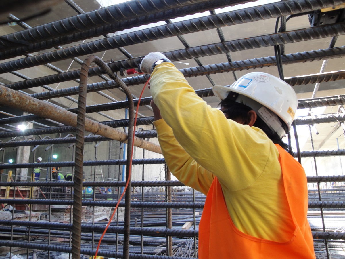 Installing VWS-2000 vibrating wire strain gauges on pile cage for Doha Airport construcrtuion